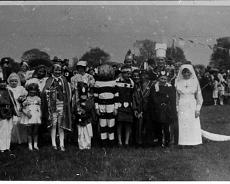 S1503 An under 14 fancy dress competition. 1937 Coronation celebrations. Soldier in the front row is Theo Christophers