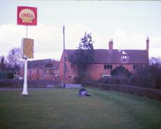 JoyW_2_0018 Malthouse Farm with sign from old garage on corner of Station Lane