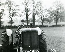 Quarry Farm 4 Eric tractor A Young Eric Johnson in a Rowington field