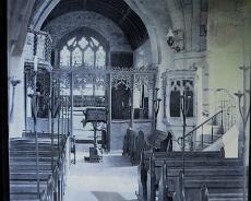 P1060986a Interior of St Laurence 1899. Note the screen with the old organ loft behind and to the left, and the wall painting around the East window