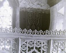 P1070002 Detail of East wall from 1899 interior photo. The wall hangings are still in use as curtains in the Lady Chapel!