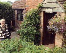 Rangora Len Dolphin outside Rangora Cottage