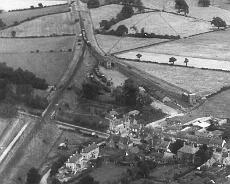 RW1040-21 An aerial view of Henley-in-Arden in 1930 showing the layout of the original terminus station plus the engine shed and goods shed and yard. The connecting line...